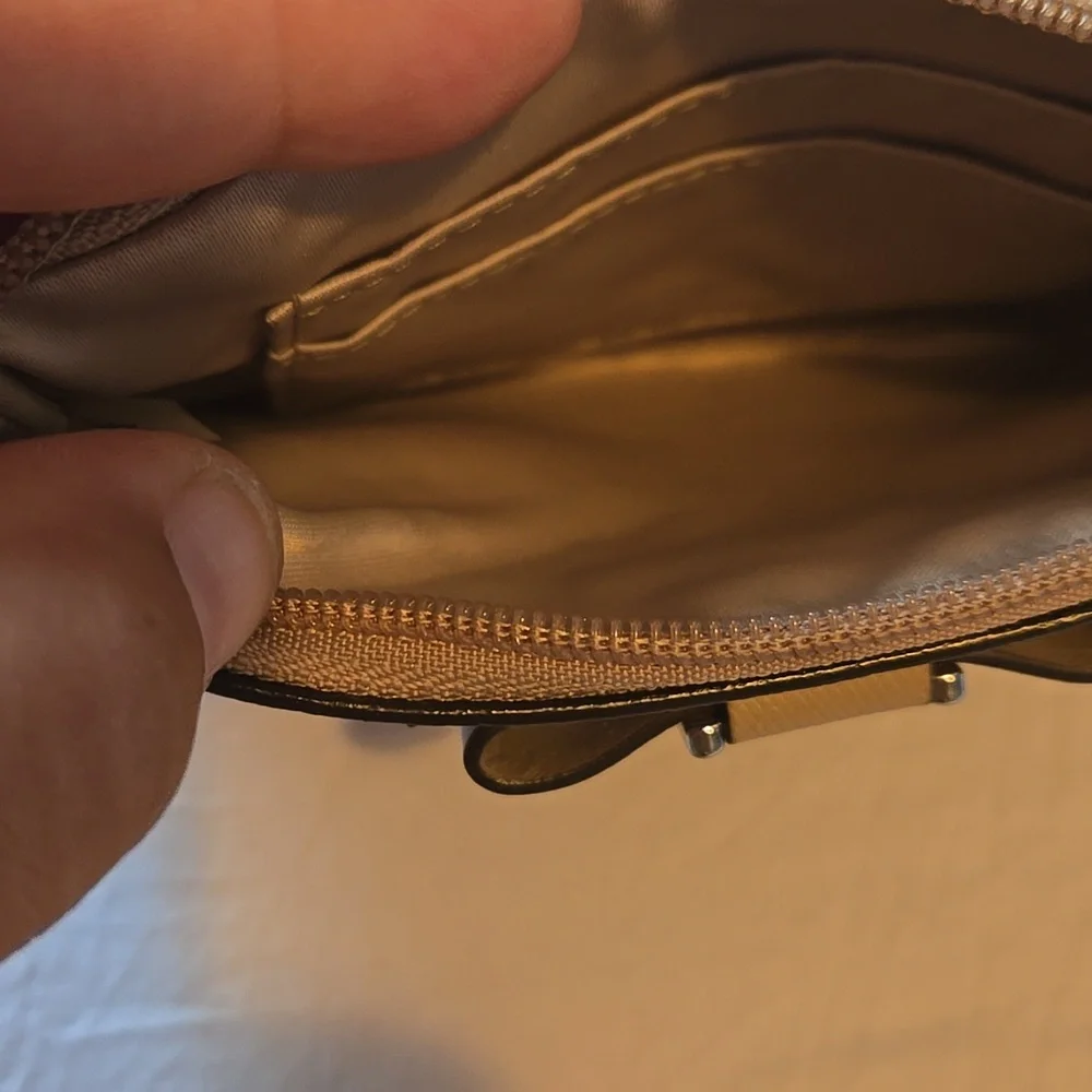 Coach Tan Wristlet Clutch with Bow Accent